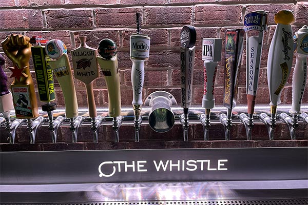 Beer on tap at The Whistle Sports Bar & Grill in Chicago