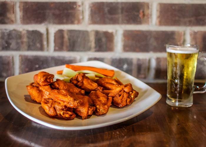 Wings-and-beer from The Whistle Sports Bar & Grill in Chicago